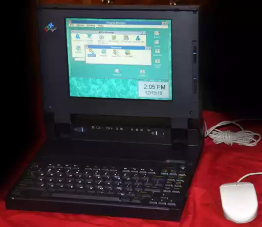 A photo of an IBM PS/2 CL 57 SX notebook computer