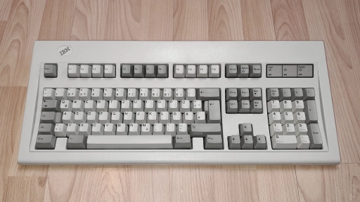 A photo of an IBM PS/2 Enhanced Keyboard