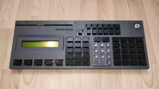 A photo of an IBM Modular 67-Key POS Keyboard with LCD Display