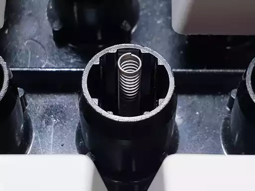 A photo showing an exposed IBM membrane buckling spring keyswitch