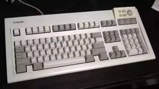 A photo of a Lexmark Classic Touch Keyboard with Integrated 25mm Trackball